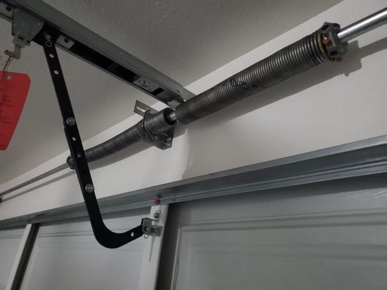 Torsion spring installed on a garage door